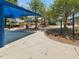 A sun-shaded playground with a playground structure provides an enjoyable experience at 1390 S Hillcrest Ave, Clearwater, FL 33756