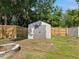 Gray storage shed in fenced backyard area at 1390 S Hillcrest Ave, Clearwater, FL 33756