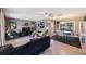 Open-concept living space with modern furniture, stylish decor, and abundant natural light, perfect for comfortable living at 1410 Lime St, Clearwater, FL 33756