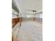 Open bedroom area with cinder block walls and windows, ready for a complete remodel and personalized touches at 1734 Maryland Ne Ave, St Petersburg, FL 33703