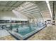 Bright, spacious indoor pool provides year-round swimming and fitness opportunities for all residents at 1803 Pacific Dunes Dr, Sun City Center, FL 33573