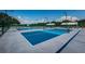Outdoor pickleball courts feature blue playing surfaces and shaded viewing areas at 1803 Pacific Dunes Dr, Sun City Center, FL 33573