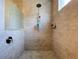 Large walk-in shower featuring a tile surround, window and dual shower heads at 1803 Pacific Dunes Dr, Sun City Center, FL 33573