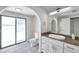 Bathroom boasting a modern sink and cabinet along with a glass door shower at 186 Dan River Dr, Spring Hill, FL 34606