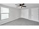 Bedroom showcasing natural light through the windows, and a ceiling fan at 186 Dan River Dr, Spring Hill, FL 34606