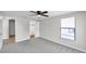 Bedroom featuring carpet, closet, window and ceiling fan at 186 Dan River Dr, Spring Hill, FL 34606