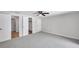 Bedroom showcasing neutral carpet and closet and bathroom doorways at 186 Dan River Dr, Spring Hill, FL 34606