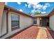 Close-up of home exterior with tidy landscaping and well-maintained siding at 186 Dan River Dr, Spring Hill, FL 34606