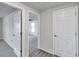 Hallway showing the doors and flooring at 186 Dan River Dr, Spring Hill, FL 34606