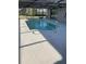 Inviting screened-in pool, perfect for relaxing and enjoying outdoor living at 186 Dan River Dr, Spring Hill, FL 34606