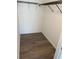 Walk-in closet with wood flooring and wire shelving at 186 Dan River Dr, Spring Hill, FL 34606