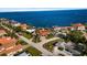 Aerial view of a property showing its lush landscaping and convenient access to the bay, surrounded by similar homes at 2012 Carolina Ne Cir, St Petersburg, FL 33703