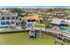 Aerial view of waterfront homes with pools, docks and ocean access at 2012 Carolina Ne Cir, St Petersburg, FL 33703