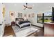 Cozy bedroom featuring wood floors, neutral walls, decorative window and ample natural light at 2012 Carolina Ne Cir, St Petersburg, FL 33703