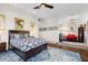 Spacious bedroom with hardwood floors, and bright walls offers a relaxing and airy atmosphere at 2012 Carolina Ne Cir, St Petersburg, FL 33703