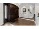 Elegant entryway featuring a dark wood door, hardwood flooring, and recessed lighting at 2012 Carolina Ne Cir, St Petersburg, FL 33703