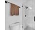 Bathroom featuring a glass shower with gray hexagon tile, and modern fixtures at 2531 Earlswood Ct, Brandon, FL 33510