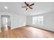 Bonus room with wood floors, ceiling fan, and a window with natural light at 2531 Earlswood Ct, Brandon, FL 33510