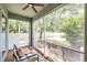 Enjoy a screened-in patio with a ceiling fan and comfortable seating at 2531 Earlswood Ct, Brandon, FL 33510