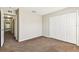 Bedroom showcasing closet and view into hallway at 256 Castlekeeper Pl, Valrico, FL 33594