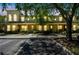 Charming townhome exterior with manicured landscaping and convenient parking at 256 Castlekeeper Pl, Valrico, FL 33594