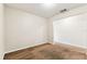 Open room with carpet, neutral walls, and plenty of space at 256 Castlekeeper Pl, Valrico, FL 33594