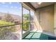 Screened patio featuring green carpet and views of the surrounding landscaping at 256 Castlekeeper Pl, Valrico, FL 33594