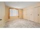 Bedroom featuring tile floors and double closets at 2699 Seville Blvd # 705, Clearwater, FL 33764