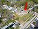 Aerial view points to a property with great yard space, parking, and easy street access at 318 Banana St, Tarpon Springs, FL 34689