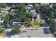 Aerial view showcasing a well-manicured yard with alley access, providing a unique perspective of the property at 318 Banana St, Tarpon Springs, FL 34689