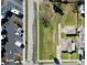 Aerial view showcases a property with ample space near parking and community features at 318 Banana St, Tarpon Springs, FL 34689