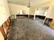 Spacious living room awaiting updates, featuring bright light and great potential at 318 Banana St, Tarpon Springs, FL 34689