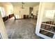 Open living room awaiting remodeling, showcasing natural light and layout potential at 318 Banana St, Tarpon Springs, FL 34689