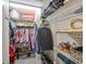 Walk-in closet with clothing racks and shelves for ample storage and organization at 319 Kelsey Way, Sun City Center, FL 33573
