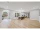 Spacious dining area featuring hardwood floors, stylish lighting, and an inviting atmosphere at 3215 W Fair Oaks Ave, Tampa, FL 33611