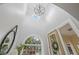Elegant foyer showcasing high ceilings, stylish light fixtures, and a grand entrance at 3215 W Fair Oaks Ave, Tampa, FL 33611