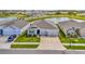 Well-maintained single-Gathering home boasts a picturesque pond view and lush green lawn at 3504 Golden Wheat Ln, Plant City, FL 33565