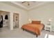 Comfortable main bedroom with en-suite bathroom and walk-in closet at 3504 Golden Wheat Ln, Plant City, FL 33565