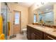 Bathroom featuring a granite countertop, tiled floor, and glass shower at 4215 Water Oaks Ln, Tampa, FL 33618