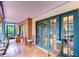 Charming screened patio with tile flooring and comfortable seating, perfect for relaxing and enjoying the outdoors at 4215 Water Oaks Ln, Tampa, FL 33618