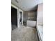 Modern bathroom featuring a large walk-in shower, separate toilet room, and neutral finishes for a clean aesthetic at 4323 Baynes Rd, North Port, FL 34288
