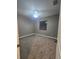 Bedroom featuring neutral tones, carpet and a ceiling fan at 4323 Baynes Rd, North Port, FL 34288