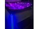 Modern hot tub illuminated with colorful LED lights at 4323 Baynes Rd, North Port, FL 34288