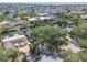 Neighborhood aerial view showcases the canals and boat docks nearby at 4368 Marine Pkwy, New Port Richey, FL 34652