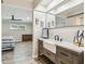 Modern bathroom with a large vanity, stylish mirror, and easy access to a bedroom at 4368 Marine Pkwy, New Port Richey, FL 34652