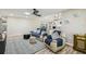 Comfortable living room showcasing wood floors and open access to other parts of the home at 4368 Marine Pkwy, New Port Richey, FL 34652