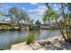 Picturesque waterfront featuring private boat docks and lush tropical landscaping at 4368 Marine Pkwy, New Port Richey, FL 34652