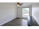 Bright bedroom featuring neutral walls, and a ceiling fan at 4520 Wescott Ln, Tampa, FL 33624