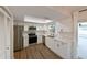 Updated kitchen with stainless steel appliances, sleek white cabinets, and ample counter space at 4520 Wescott Ln, Tampa, FL 33624