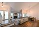 Bright living room with high ceilings, lots of natural light, fireplace, and open floor plan at 4520 Wescott Ln, Tampa, FL 33624